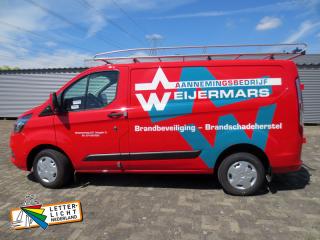 Autoreclame met sticker.